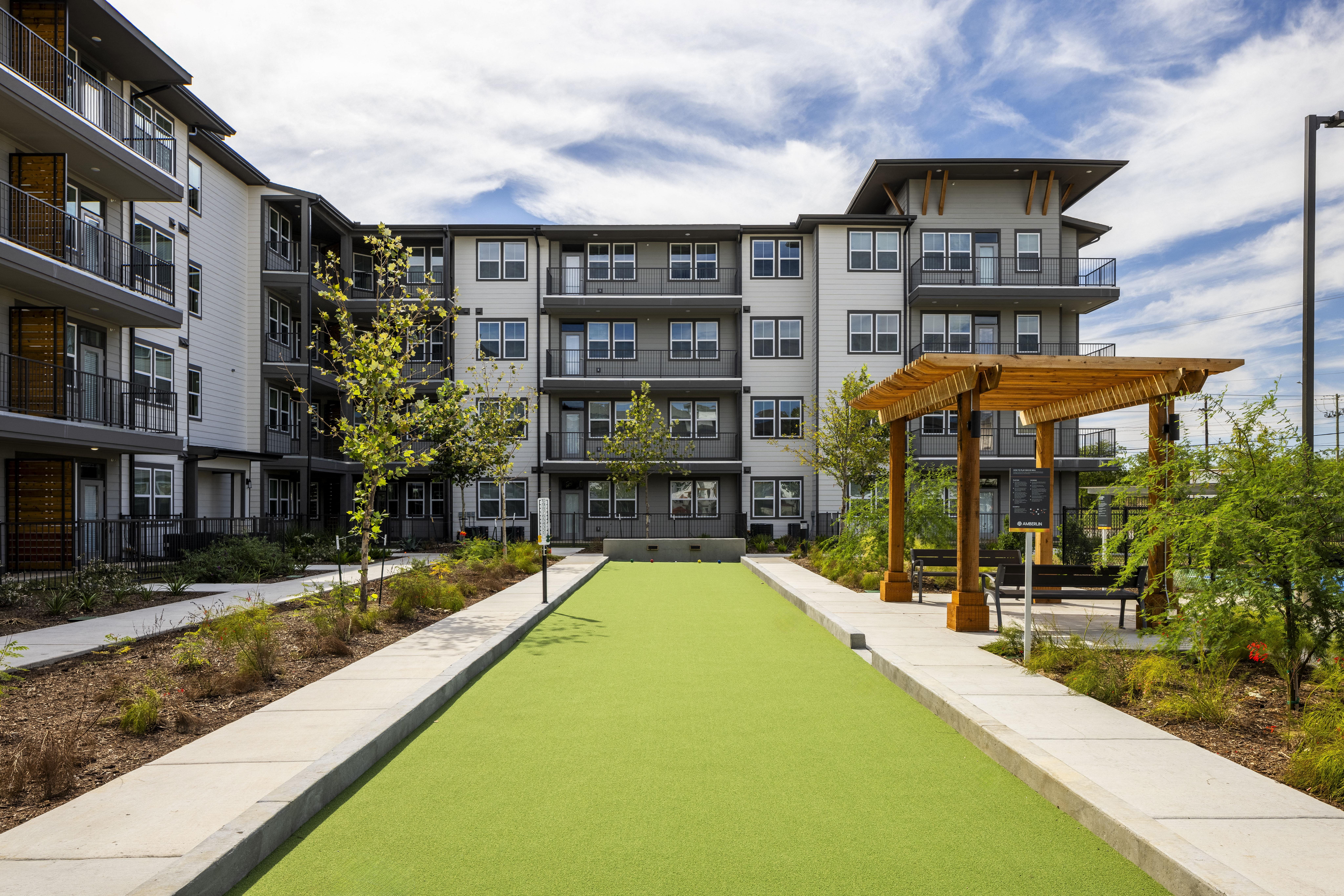 a bocce ball court at a senior apartment community
